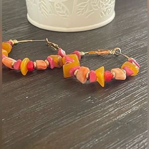 Colorful stone hoops in pink and orange tones